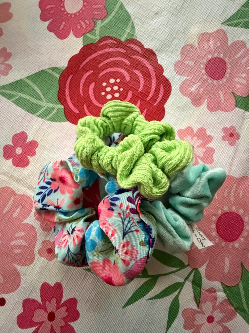 3 for the prices of 1 floral and plain scrunchies .